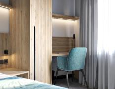 Beispiel eines Doppelzimmers mit türkisem Dekor im Hotel Zdravilisce Lasko